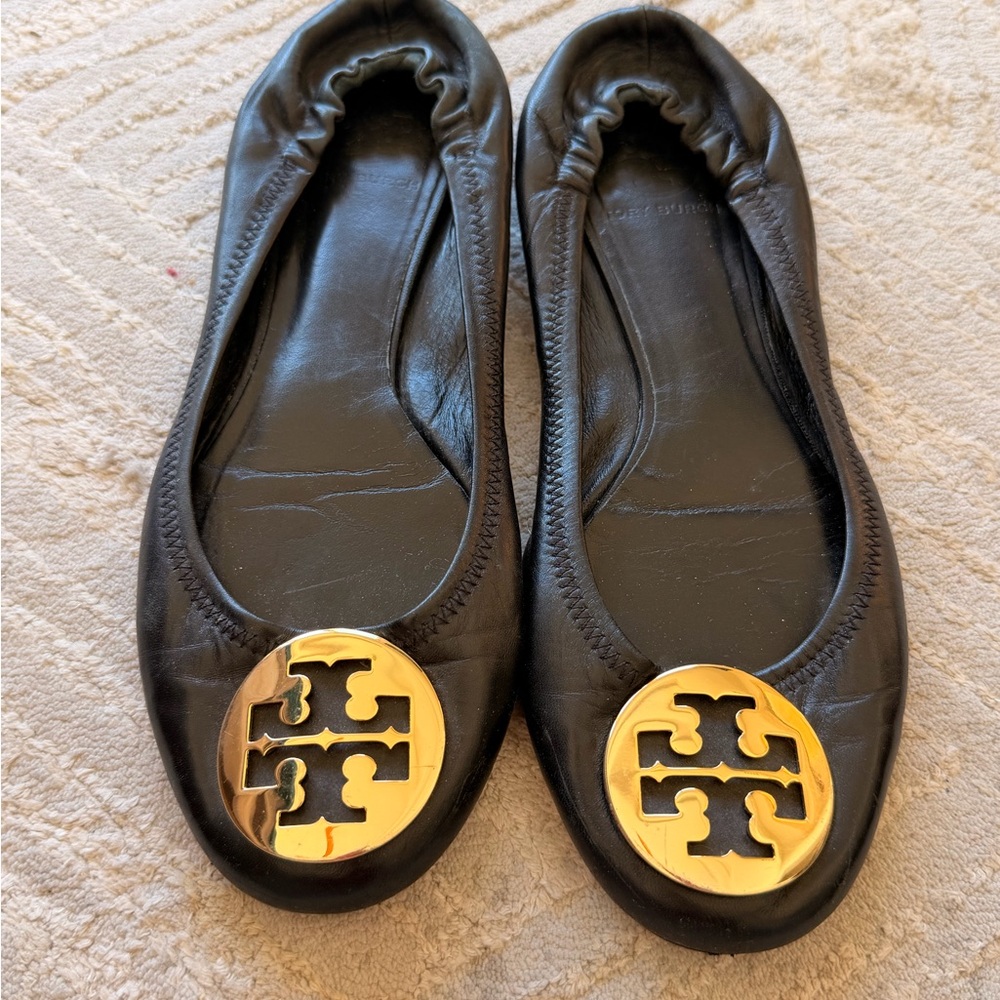 Tory Burch Black Flats with Gold Emblem